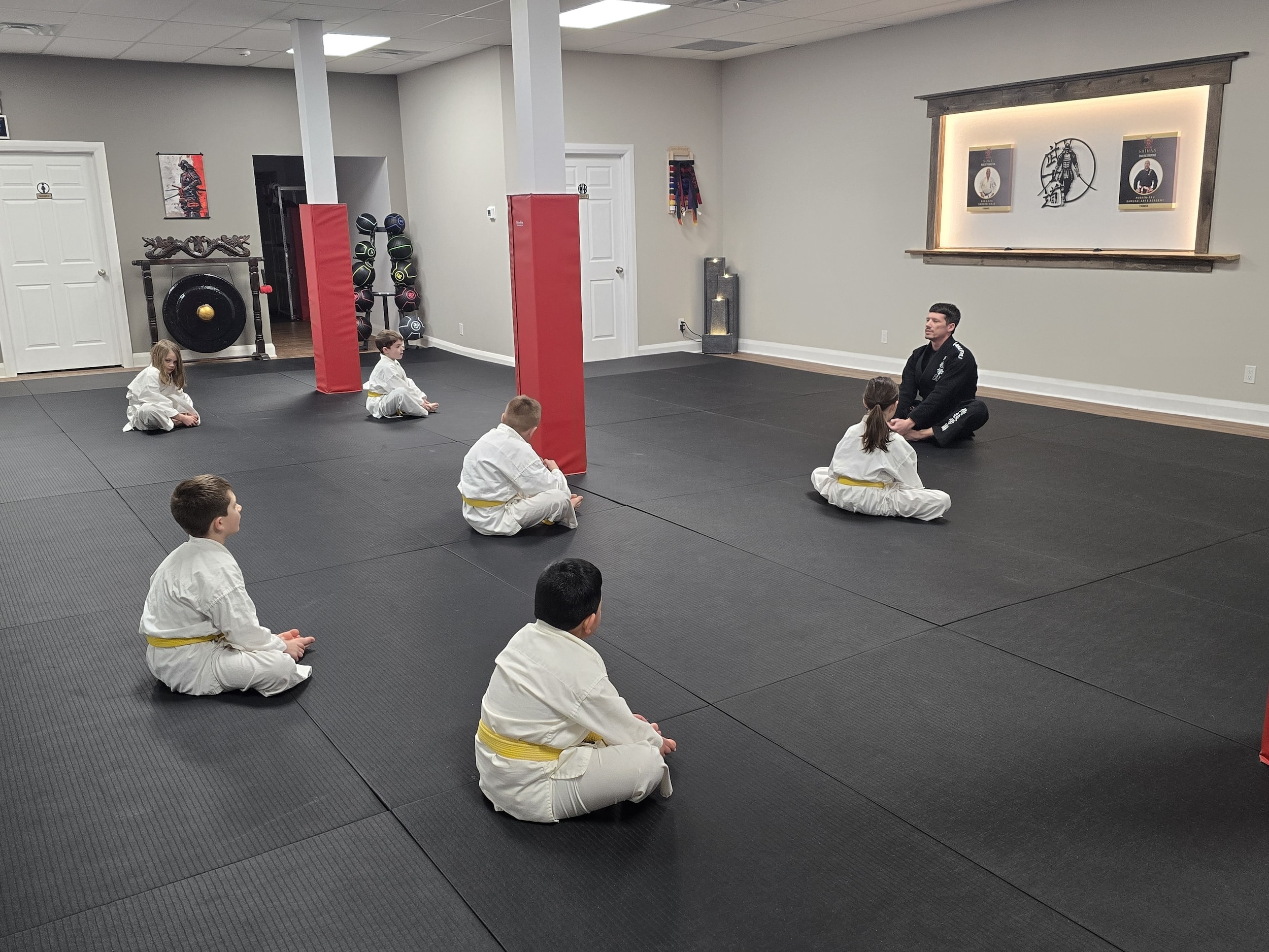 Samurai Arts Academy Chesterville instructor with young jiu-jitsu students
